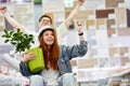 Beautiful young couple having fun while choosing things for home in the market Royalty Free Stock Photo