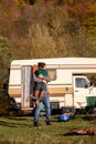 Beautiful young couple having a romantic camping site in the mountains