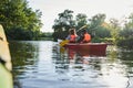 Beautiful young couple kayaking on lake Royalty Free Stock Photo