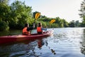 Beautiful young couple kayaking on lake Royalty Free Stock Photo