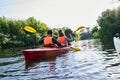 Beautiful young couple kayaking on lake Royalty Free Stock Photo