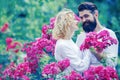 Beautiful young couple kissing and embracing. Beautiful young sensual woman love affectionate man. Romantic couple in Royalty Free Stock Photo