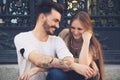 Beautiful young couple laughing in the city