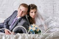 Beautiful young couple lying on bed Royalty Free Stock Photo