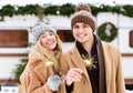 Beautiful Young Couple With Sparklers In Hands Posing At Winter Day Outdoors Royalty Free Stock Photo