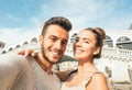 Beautiful young couple taking a selfie enjoying the time on their trip to Venice - Boyfriend and girlfriend taking a picture Royalty Free Stock Photo