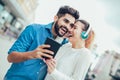 Beautiful young couple walking down the street Royalty Free Stock Photo