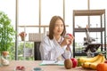 Beautiful young doctor showing heart examination Royalty Free Stock Photo