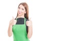 Beautiful young employee giving double thumbs up Royalty Free Stock Photo