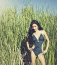 Beautiful young exotic woman in swimsuit Royalty Free Stock Photo