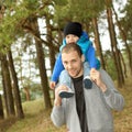 Beautiful young family having fun outdoors Royalty Free Stock Photo