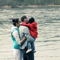 Beautiful young family having fun outdoors Royalty Free Stock Photo