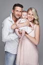 Beautiful young family with little baby Royalty Free Stock Photo