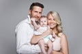 Beautiful young family with little baby Royalty Free Stock Photo