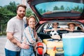 beautiful young family packing luggage Royalty Free Stock Photo