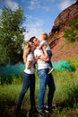 Beautiful young family on a walk in summer Royalty Free Stock Photo