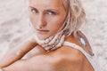 Beautiful young fashion model on the beach. Close up portrait of boho model Royalty Free Stock Photo