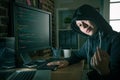 Beautiful young female hacker face to camera