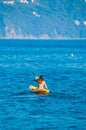 Young woman paddling in kanu kayak Royalty Free Stock Photo