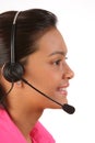 Beautiful young female receptionist on telephone Royalty Free Stock Photo