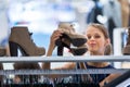 Beautiful young female shopper in a clothing store Royalty Free Stock Photo