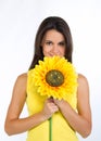 Beautiful young female with a sunflower Royalty Free Stock Photo