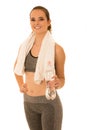 Beautiful young fit woman in shape drinks water after workout is Royalty Free Stock Photo