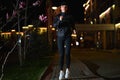 Beautiful Fitness Woman in Black Athletic Wear Jogging On Street Alone, Night