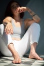 Beautiful young ginger woman with freckles and blue eyes. Portrait of charming girl wearing casual clothes posing at home, Royalty Free Stock Photo