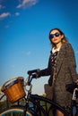 Beautiful young girl on the beach with cruiser bicycle Royalty Free Stock Photo