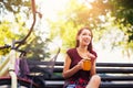 Beautiful young girl with a bicycle in the city Royalty Free Stock Photo