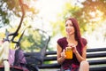 Beautiful young girl with a bicycle in the city Royalty Free Stock Photo