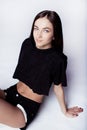 Beautiful young girl in black shorts and t-shirt Royalty Free Stock Photo