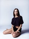 Beautiful young girl in black shorts and t-shirt Royalty Free Stock Photo