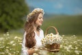 Beautiful young girl in chamomile field. Carefree happy brunette Royalty Free Stock Photo