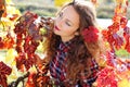 Beautiful young girl in colorful grape vineyard Royalty Free Stock Photo