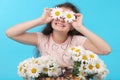 Beautiful young girl with daisy eyes Royalty Free Stock Photo