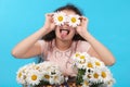 Beautiful young girl with daisy eyes Royalty Free Stock Photo