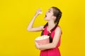 Beautiful young girl eating popcorn Royalty Free Stock Photo