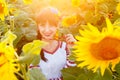 Beautiful young girl in embrodery a sunflower plant Royalty Free Stock Photo