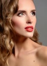 Beautiful young girl with an evening makeup and long blond hair. Royalty Free Stock Photo