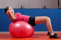 Cute girl abdomen workout with ball