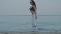 Beautiful girl exercising on the sandy beach Royalty Free Stock Photo