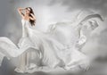 Beautiful young girl in flying white dress. Royalty Free Stock Photo