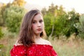 Beautiful young girl in a garden