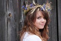 Beautiful young girl with grain wreath Royalty Free Stock Photo