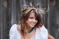 Beautiful young girl with grain wreath Royalty Free Stock Photo