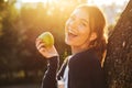 Beautiful young girl holding apple Royalty Free Stock Photo