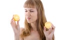 Beautiful young girl holding a sour lemon isolated Royalty Free Stock Photo