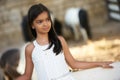 Beautiful young girl and horses in stall Royalty Free Stock Photo